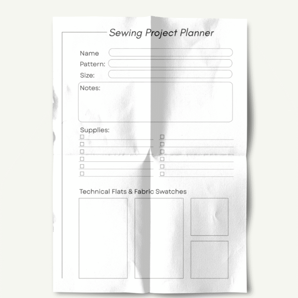 A single printed page of the 'Sewing Project Planner' with visible folds and creases. It includes fields for name, pattern, size, a large notes section, a checklist for supplies, and blank boxes labeled 'Technical Flats & Fabric Swatches.' The page has a slightly worn and realistic paper texture.