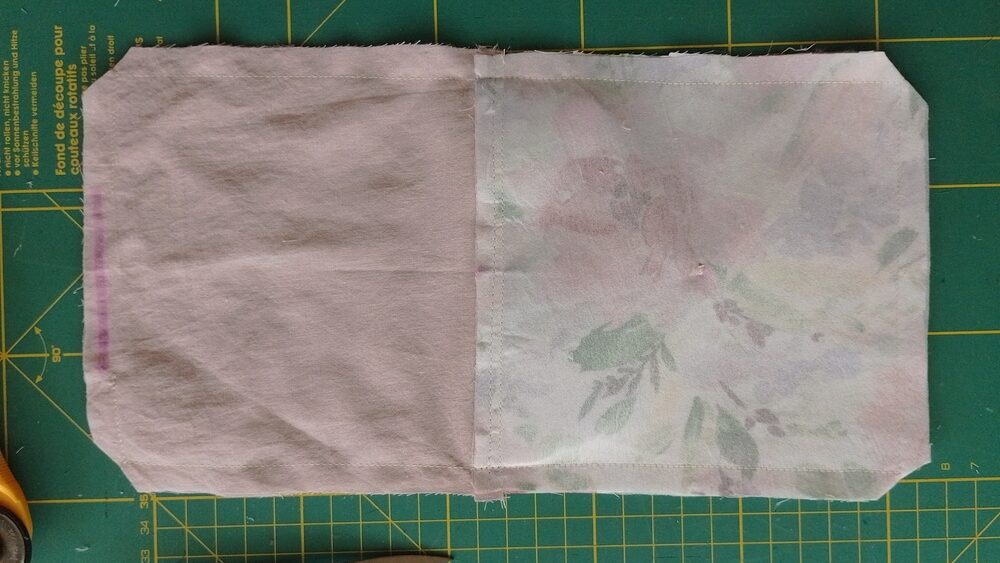 Pouch panels sewn together around the edges with corners trimmed diagonally.