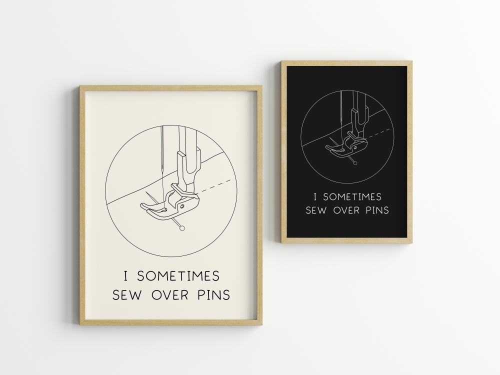 Two framed prints with a line drawing of a sewing machine presser foot and the text 'I sometimes sew over pins', shown in light and dark color versions.