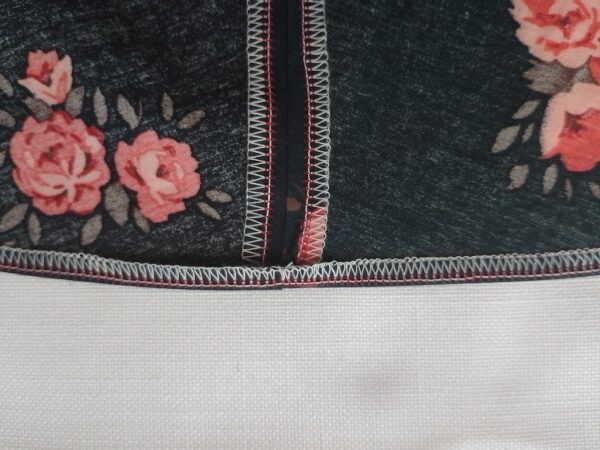 A close-up of the skirt's bottom edge folded over once to the wrong side