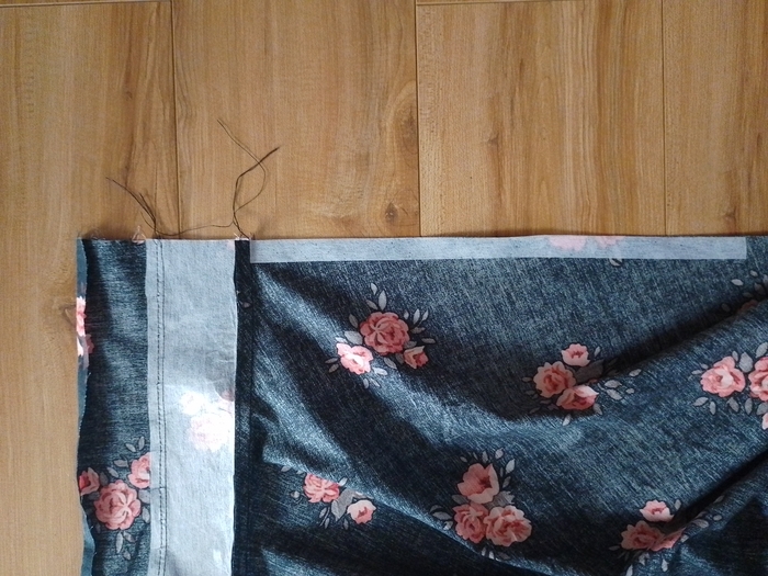 A narrow strip of fusible interfacing applied to the wrong side of the skirt's vertical seam allowance