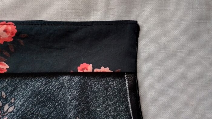 The left corner of the waistband turned right-side out.