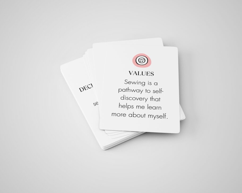 Close-up stack mockup of several printable sewing affirmation cards.