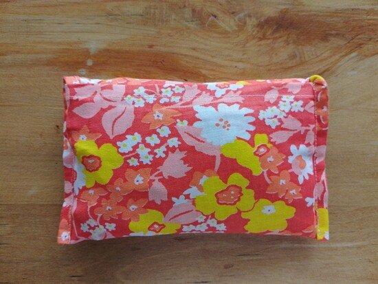 tote bag folded into a floral fabric pocket