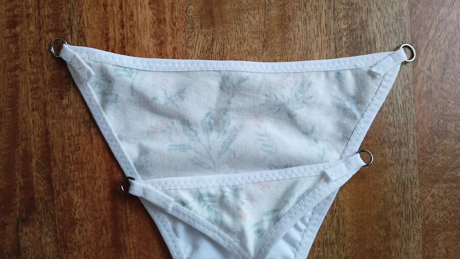 Wrong side of the g-string back and front pieces with fold over elastic hanging