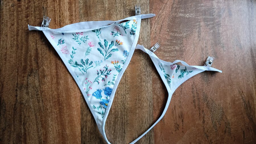 Fold-over elastic clipped to the top edges of the front and back pieces before sewing.