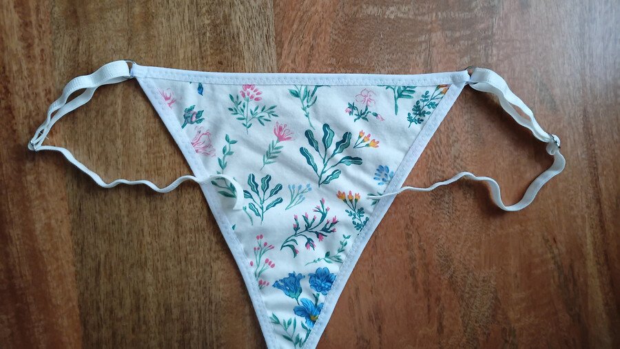 front piece of g-string with adjustable straps attached