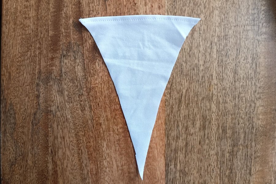 Topstitched gusset on the front piece of a g-string.