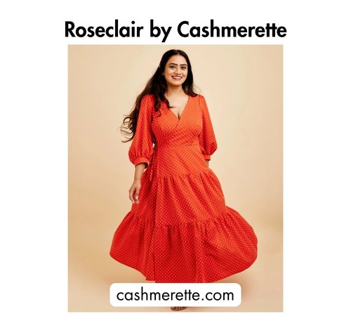 Bold black text at the top reading 'Roseclair by Cashmerette,' a woman wearing a orange polka-dot tiered maxi dress with puff sleeves, and the website cashmerette.com at the bottom.