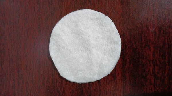 Two white flannel rounds stacked on top of each other with edges aligned